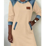 "Angelica™ – Moderna obleka s kapuco" can be rewritten as "Angelica™ – Stylish Hooded Dress".