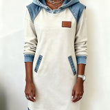 "Angelica™ – Moderna obleka s kapuco" can be rewritten as "Angelica™ – Stylish Hooded Dress".