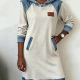 "Angelica™ – Moderna obleka s kapuco" can be rewritten as "Angelica™ – Stylish Hooded Dress".